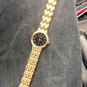 Seiko gold plated watch with black face